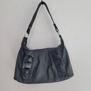 black ruffle front faux leather trapezoid single handle purse handbag twee